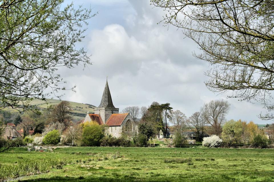 <p>This idyllic village lies in the valley of the River Cuckmere and is home to the Cathedral of the South Downs. Here, you'll enjoy a slower pace of life.</p>