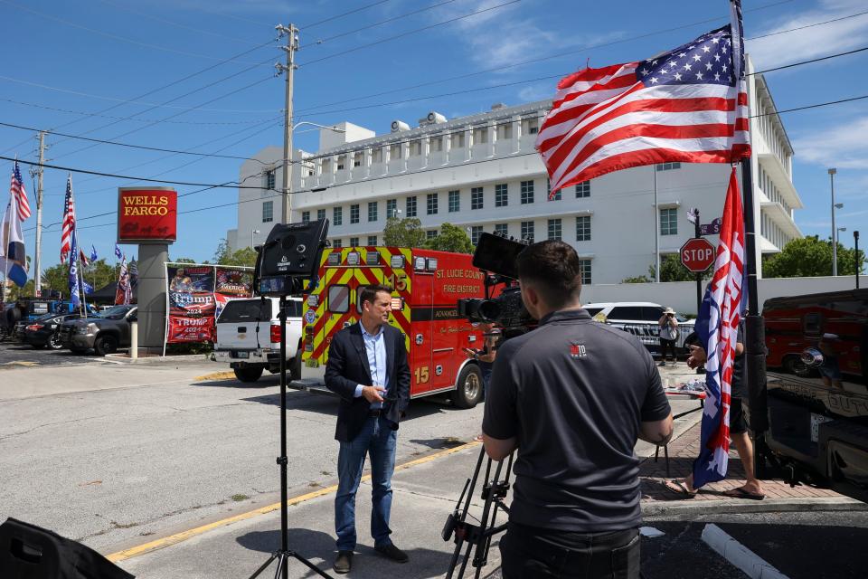 Activities outside the Alto Lee Adams, Sr. United States Courthouse as former President Donald Trump attends a classified documents court hearing Thursday, March 14, 2024, in Fort Pierce.
