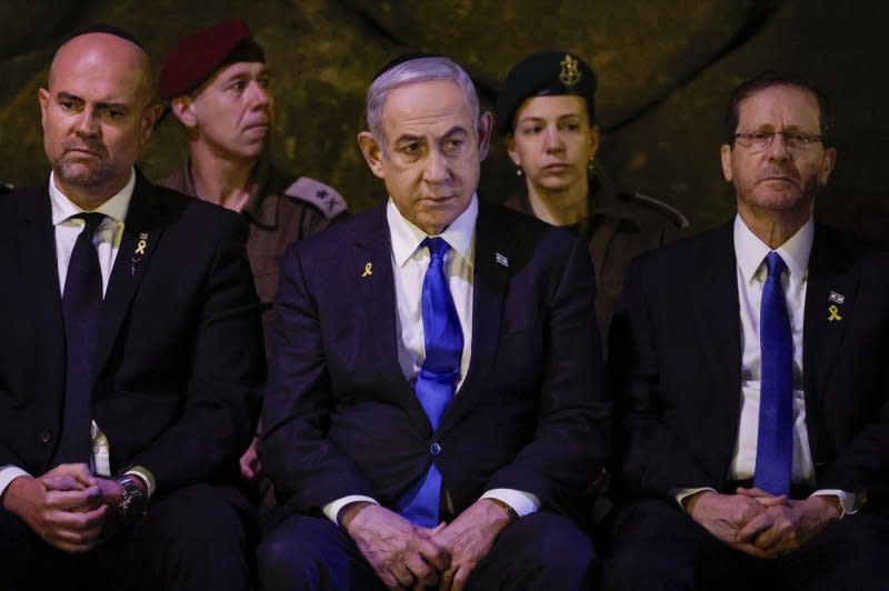 Israeli Prime Minister Benjamin Netanyahu (C) on Friday congratulated the IDF for securing the bodies of the three hostages and returning them to Israel while also pledging to bring home those that remain trapped in Gaza. File Pool photo by Amir Cohen/UPI