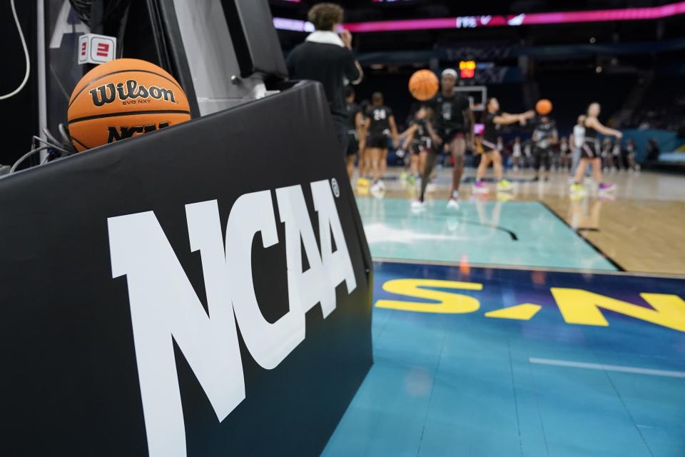 FILE - South Carolina players work out during a practice at the Women's Final Four NCAA college college basketball tournament, Saturday, April 2, 2022, in Minneapolis. NCAA athletes will be immediately eligible to play no matter how many times they transfer — as long as they meet academic requirements — after the association fast-tracked legislation Wednesday, April 17, 2024, to fall in line with a recent court order. (AP Photo/Eric Gay, File)