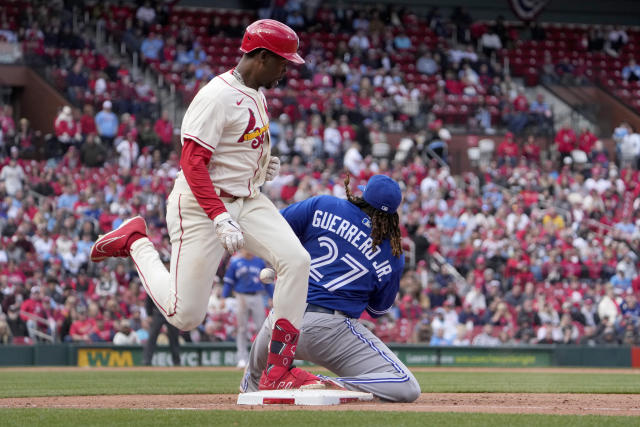 Flaherty pitches and hits Cardinals to 5-0 win