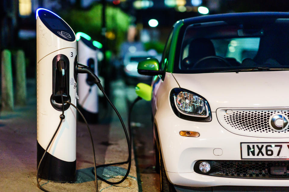 London, UK - October 20th, 2018: Smart electric car charging in the London Street st night.