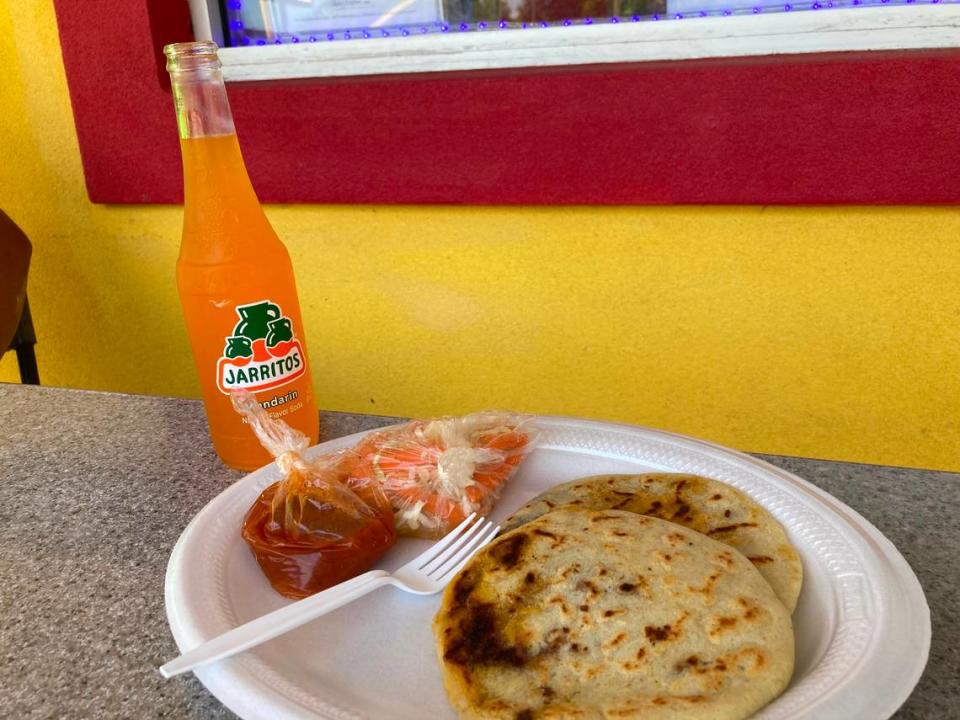 Pupusas with pickled cabbage and red sauce at Delicias Salvadorenas at 415 Green St. in Warner Robins.