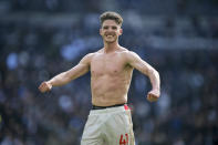 Arsenal's Declan Rice celebrates at the end of the English Premier League soccer match between Tottenham Hotspur and Arsenal at the Tottenham Hotspur Stadium in London, England, Sunday, April 28, 2024. (AP Photo/Kin Cheung)