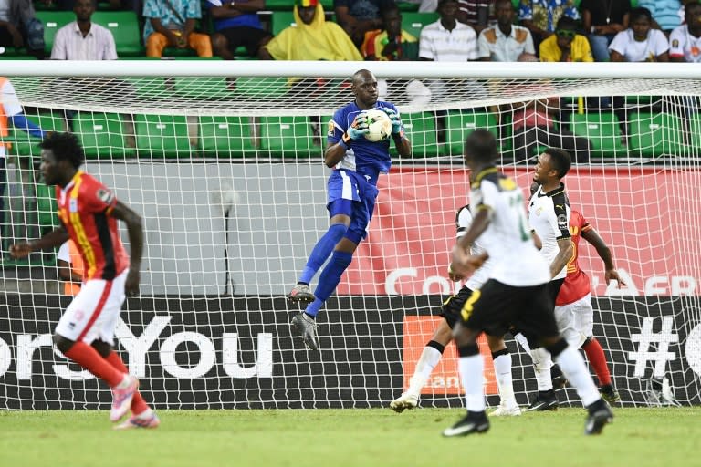 Uganda's goalkeeper Denis Onyango saves a shot on goal during the 2017 Africa Cup of Nations group D football match between Ghana and Uganda in Port-Gentil on January 17, 2017