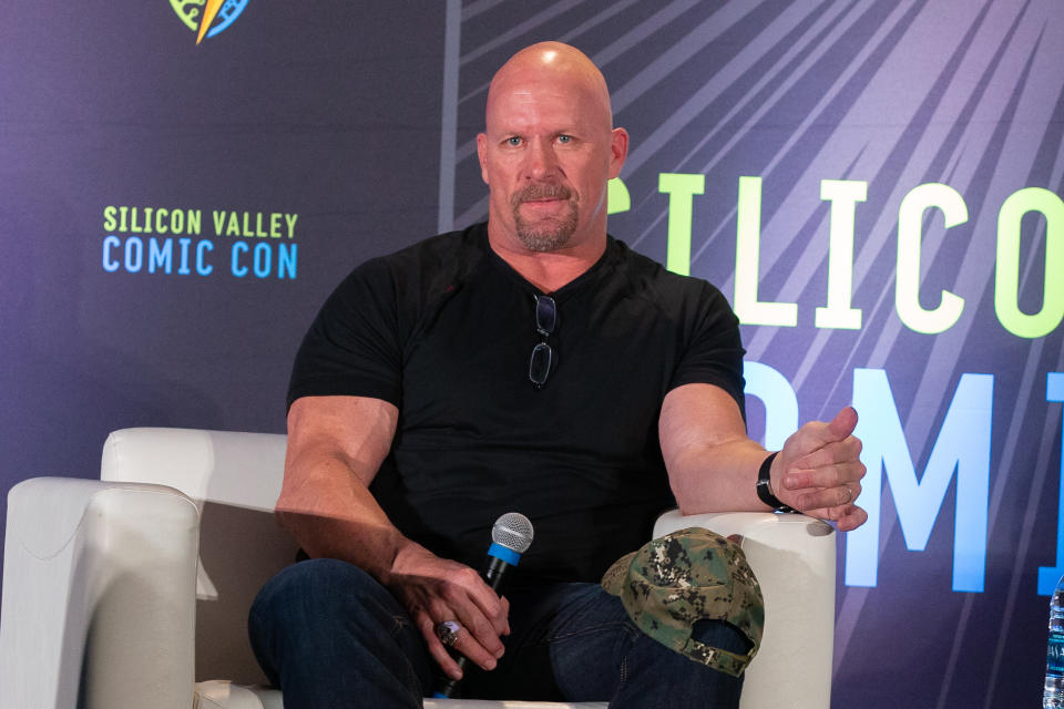 Stone Cold Steve Austin isn't here for people criticizing his mask. (Photo by Bill Watters/Getty Images)