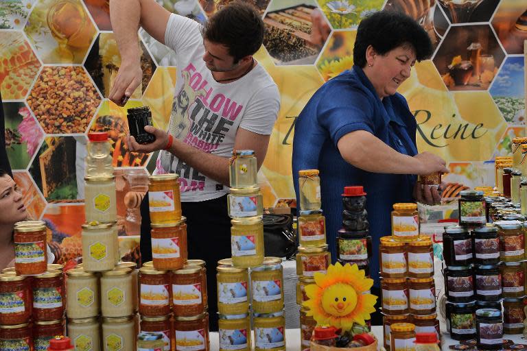 Various kinds of honey, seen at a honey and beekeeping products fair in Bucharest, April 4, 2014