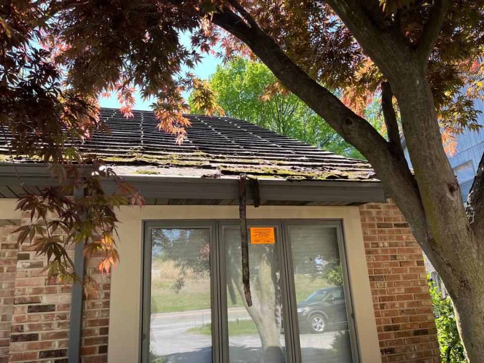 Shingles are falling off the roof at 7312 Foley Drive in Belleville, where half of a duplex has been vacant for five years.