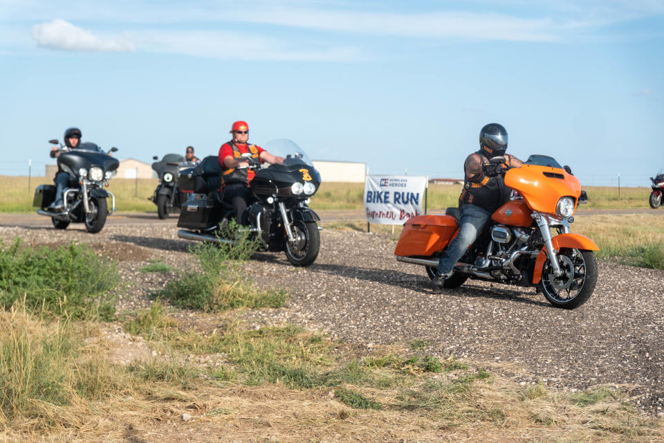 A group of riders complete their Bike Run Saturday during the Homeless Heroes fundraiser in Amarillo.