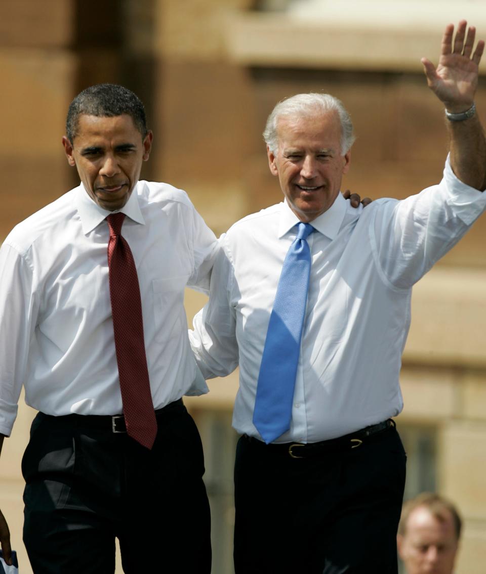 Then-Democratic presidential candidate Barack Obama, D-Ill., and his choice for a running mate, Joe Biden, appear together outside the Old State Capitol on Aug. 23, 2008, in Springfield, Ill.