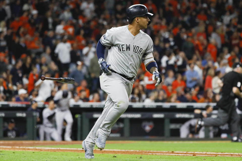 New York Yankees' Gleyber Torres rounds the bases after a run home run during the sixth inning in Game 1 of baseball's American League Championship Series against the Houston Astros Saturday, Oct. 12, 2019, in Houston. (AP Photo/Matt Slocum)