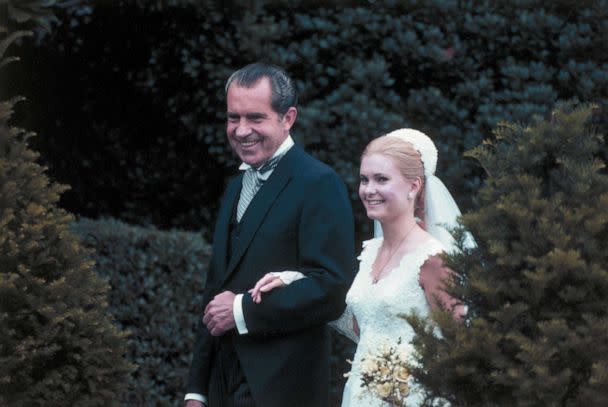 PHOTO: President Richard Nixon escorts his daughter Tricia from the White House to the rose garden for her marriage to Edward Finch Cox, June 12, 1971. (Bettmann Archive via Getty Images)