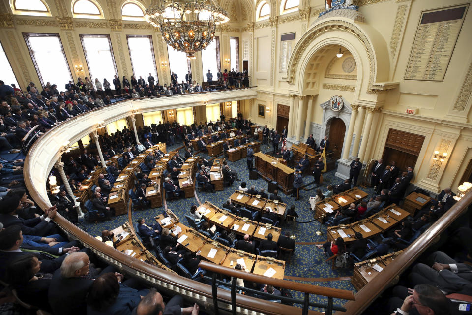 FILE - In this March 13, 2018 file photo, New Jersey Gov. Phil Murphy, standing by the flag at a podium, addresses a gathering as he unveils his 2019 budget in the Assembly chamber of the Statehouse in Trenton, N.J. The Census Bureau's failure to meet its normal deadlines could be a boon for Republicans in Virginia and a bust for Republicans in New Jersey in the two states that will run the first legislative elections since Democrats took control of the White House and Congress in 2021. (AP Photo/Mel Evans)