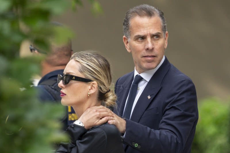 Hunter Biden (R) departs the federal court with his wife Melissa Cohen Biden from Wilmington's J. Caleb Boggs Federal Building on the third day of trial on criminal gun charges in Delaware. The president's son is seeking a new trial. Photo by Ken Cedeno/UPI