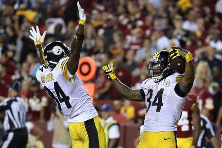 Sep 12, 2016; Landover, MD, USA; Pittsburgh Steelers running back DeAngelo Williams (34) celebrates with Steelers wide receiver Antonio Brown (84) after scoring a touchdown against the Washington Redskins in the fourth quarter at FedEx Field. The Steelers won 38-16. Mandatory Credit: Geoff Burke-USA TODAY Sports