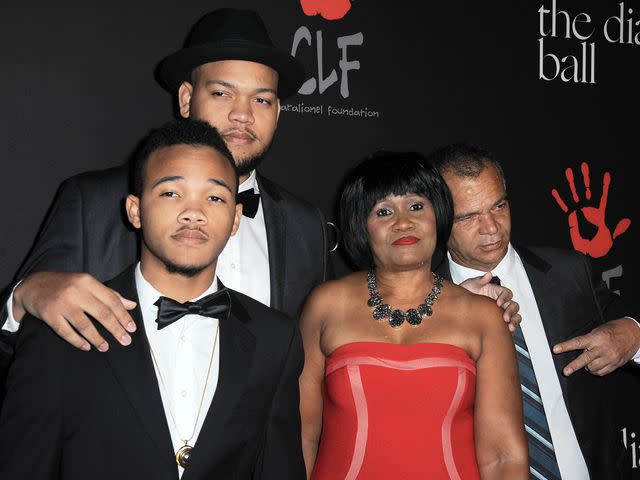 <p>Albert L. Ortega/Getty</p> Rorrey Fenty, Rajad Fenty, Monica Braithwait and Ronald Fenty at Rihanna's 1st Annual Diamond Ball in 2014.