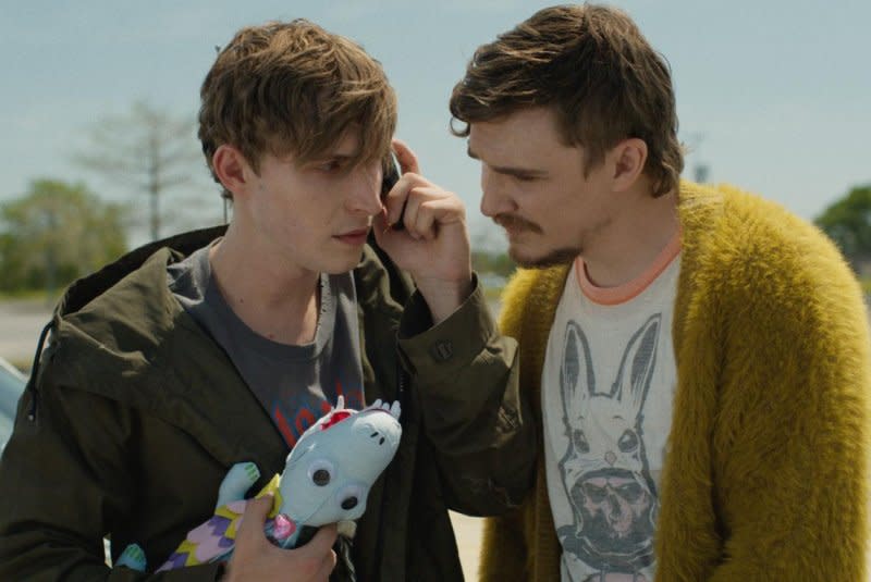 Benson (Kyle Gallner, R) listens in as Randy (Johnny Berchtold) talks to his mother. Photo courtesy of Paramount Home Entertainment and MGM+