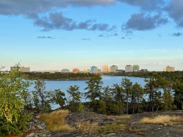 Yellowknife over Frame Lake in September of 2021. A second death and 62 new cases of COVID-19 were reported in the N.W.T. Monday. (Sara Minogue/CBC - image credit)