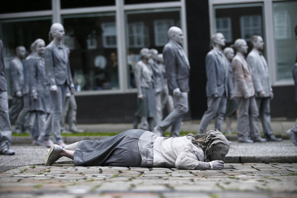 <p>Participants perform during the so called “1000 Figures” demonstration before the upcoming G20 summit in Hamburg, Germany, July 5, 2017. (Hannibal Hanschke/Reuters) </p>