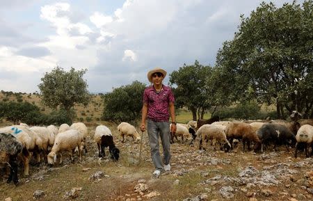 Demhat Tari poses for a picture during an interview with Reuters in Diyarbakir, June 4, 2018. REUTERS/Umit Bektas