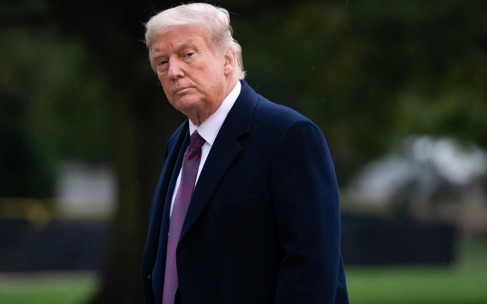 US President Donald Trump walks from Marine One after arriving on the South Lawn of the White House in Washington, DC, October 1, 2020, following campaign events in New Jersey. - White House Chief of Staff Mark Meadows said on October 1, 2020, that he was optimistic about a rapid recovery for the president as he confirmed that Trump has "mild symptoms" after testing positive for Covid-19. "The president and the First Lady... remain in good spirits," Meadows told reporters. (Photo by SAUL LOEB / AFP) (Photo by SAUL LOEB/AFP via Getty Images)