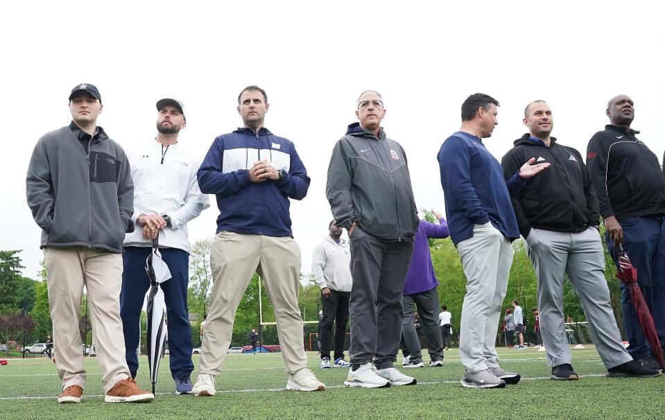 College coaches from around the country observe Iona Prep football players at Iona Prep High School in New Rochelle on Wednesday, May 15, 2024.