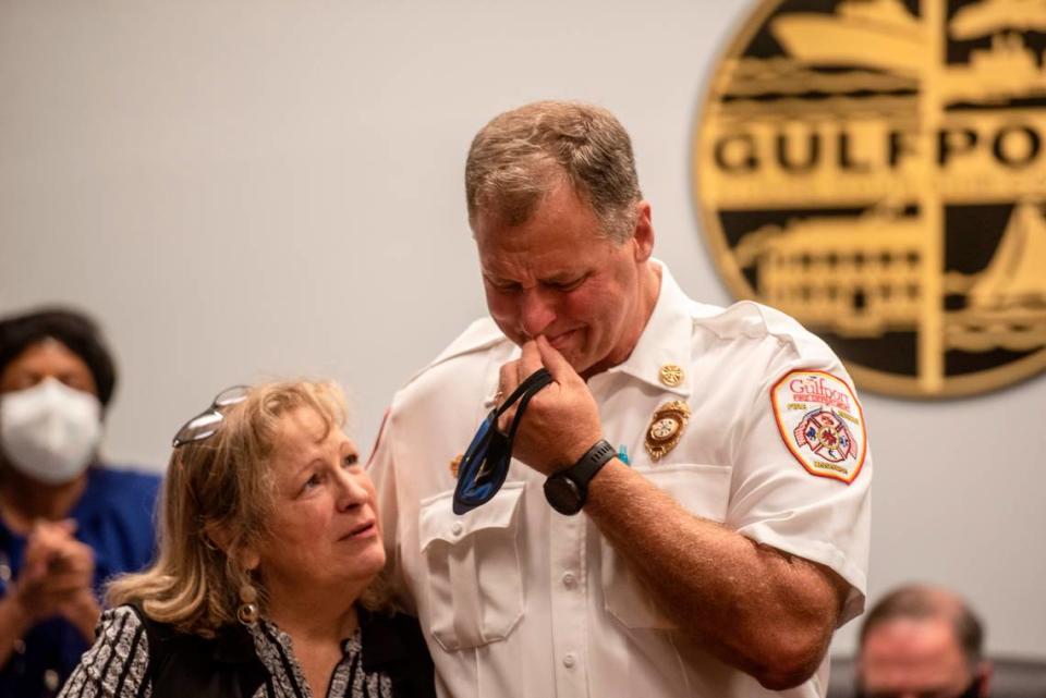 Former Gulfport Fire Chief Michael Beyerstedt tears up as he accepts congratulations from Gulfport City Council on his retirement on Tuesday, Sept. 7, 2021.