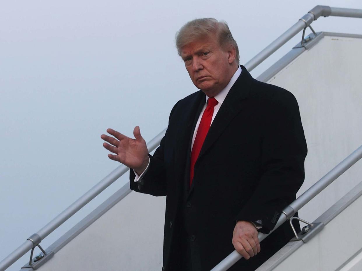 US president Donald Trump arrives aboard Air Force One en route to the Word Economic Forum in Davos at Zurich International Airport in Switzerland on 21 January 2020: Jonathan Ernst/Reuters