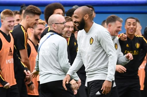 Thierry Henry enjoys a joke during a Belgium training session ahead of the World Cup semi-final against his native France