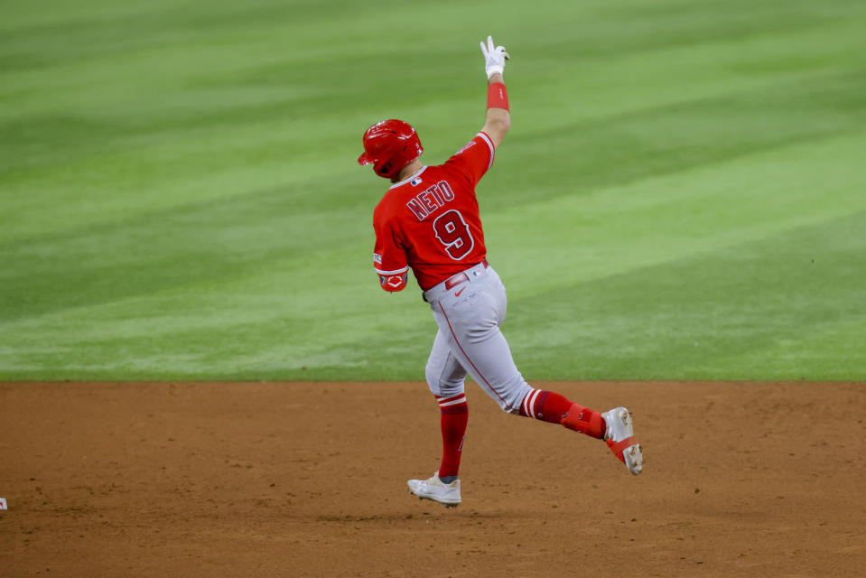 Los Angeles Angels' Zach Neto jogs the bases after hitting a home run during the ninth inning of a baseball game against the Texas Rangers, Tuesday, June 13, 2023, in Arlington, Texas. (AP Photo/Gareth Patterson)