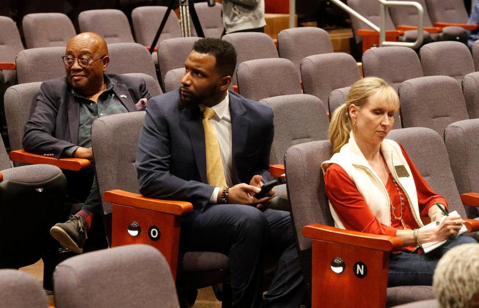 SCCPSS School Board President Roger Moss sits with board representative Paul Smith and Denise Grabowski during a forum seeking input for the next Superintendent on Wednesday March 22, 2023 at Beach High School.