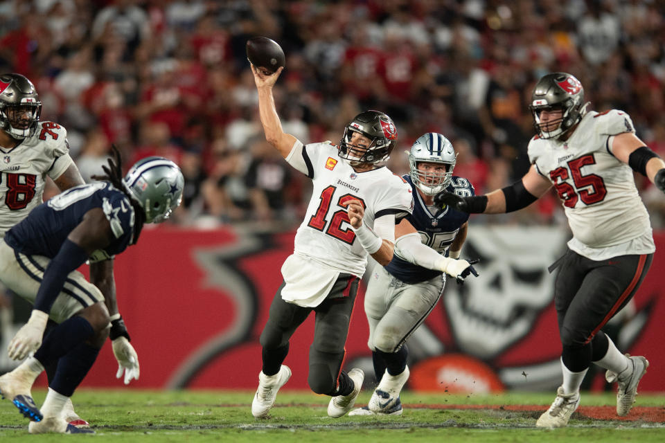 Sep 9, 2021; Tampa, Florida, USA;  Tampa Bay Buccaneers quarterback Tom Brady (12) of the NFL throws the ball against the Dallas Cowboys in the fourth quarter at Raymond James Stadium. Mandatory Credit: Jeremy Reper-USA TODAY Sports