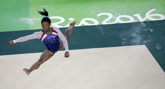 United States' Simone Biles performs on the floor during the artistic gymnastics women's individual all-around final at the 2016 Summer Olympics in Rio de Janeiro, Brazil, Thursday, Aug. 11, 2016. (AP Photo/Julio Cortez)