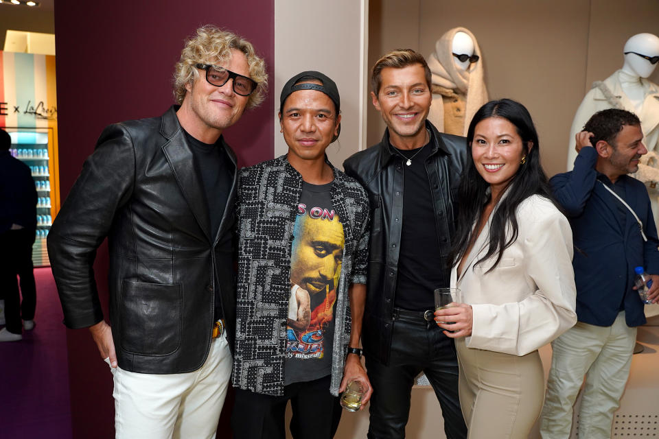 Revolve Gallery during New York Fashion Week, Sept. 9, 2021. From left, designer Peter Dundas, Michael Mente, cofounder and co-CEO of Revolve, actor and Dundas business partner Evangelo Bousis and Raissa Gerona, in charge of Revolve’s brand marketing team. - Credit: Getty Images for REVOLVE