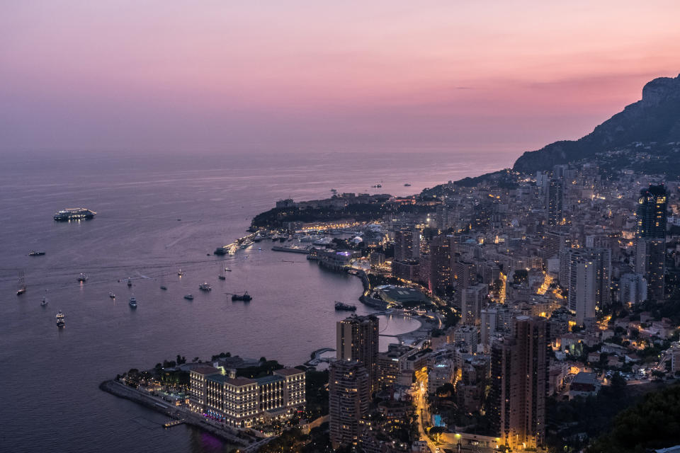 High-rise residential property and hotels stand on the Monte Carlo coastline at dusk during the Monaco Yacht Show (MYS) in Monaco, on Wednesday, Sept. 27, 2017. Over 125 of the world's most luxurious yachts will be displayed in Port Hercules during the 27th MYS which runs Sept. 27-30. Photographer: Balint Porneczi/Bloomberg via Getty Images