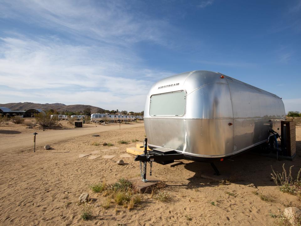 An Airstream trailer in the desert.