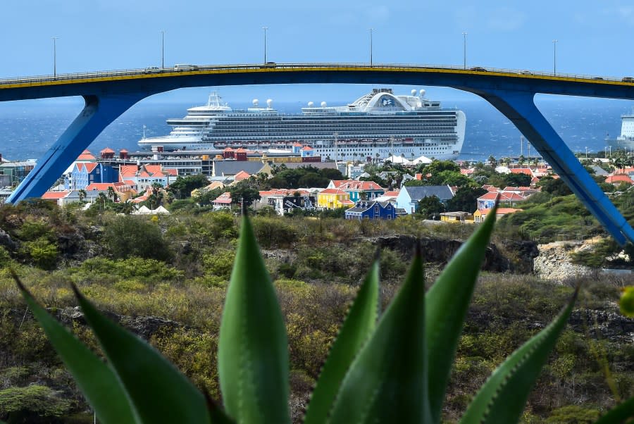 A cruise ship is seen in front of Willemstad’s Bay in Curacao, Netherlands Antilles, on February 22, 2019. (Photo credit: LUIS ACOSTA/AFP via Getty Images)