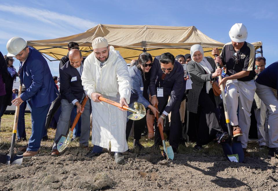 People gather at a ground breaking ceremony for the Islamic Life Center apart of the Al Salam Foundation on Saturday, Oct. 29, 2022, on Shelborne Road in Carmel. 
