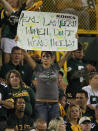 GREEN BAY, WI - SEPTEMBER 08: A fan of the Green Bay Packers holds a sign during the NFL opening season game against the New Orleans Saints at Lambeau Field on September 8, 2011 in Green Bay, Wisconsin. The Packers defeated the Saints 42-34. (Photo by Jonathan Daniel/Getty Images)