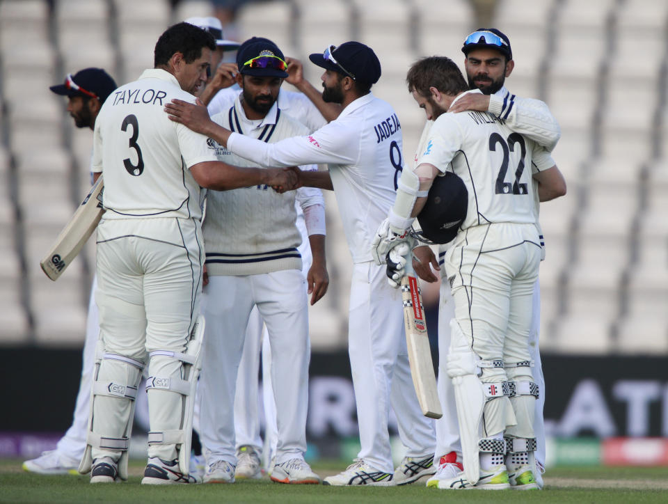 India's captain Virat Kohli, right, hugs to congratulate New Zealand's captain Kane Williamson on their win on the sixth day of the World Test Championship final cricket match between New Zealand and India, at the Rose Bowl in Southampton, England, Wednesday, June 23, 2021. (AP Photo/Ian Walton)