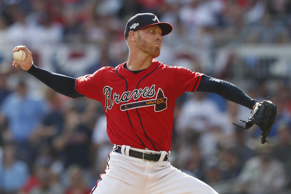 Atlanta Braves starting pitcher Mike Foltynewicz (26) works in the first inning during Game 2 of a best-of-five National League Division Series against the St. Louis Cardinals, Friday, Oct. 4, 2019, in Atlanta. (AP Photo/John Bazemore)