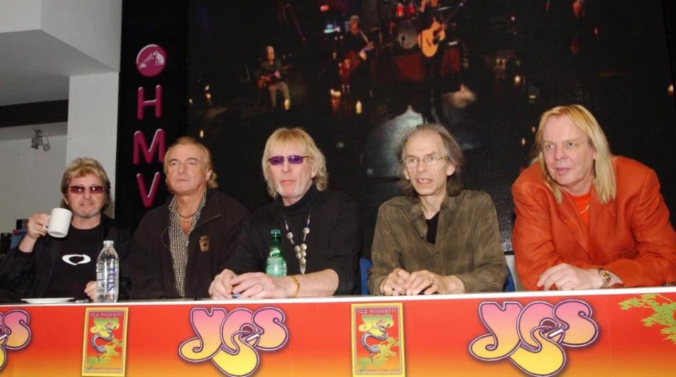 Alan White is pictured second from the left with his Yes bandmates at in in-store signing at HMV Oxford Street in 2004 (PA)