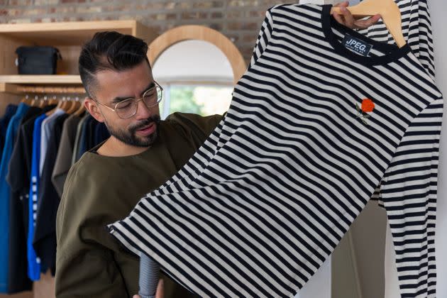 Miguel Cervantes is a designer and founder of Comercio Popular in Little Village. (Photo: Jesus J. Montero for HuffPost)