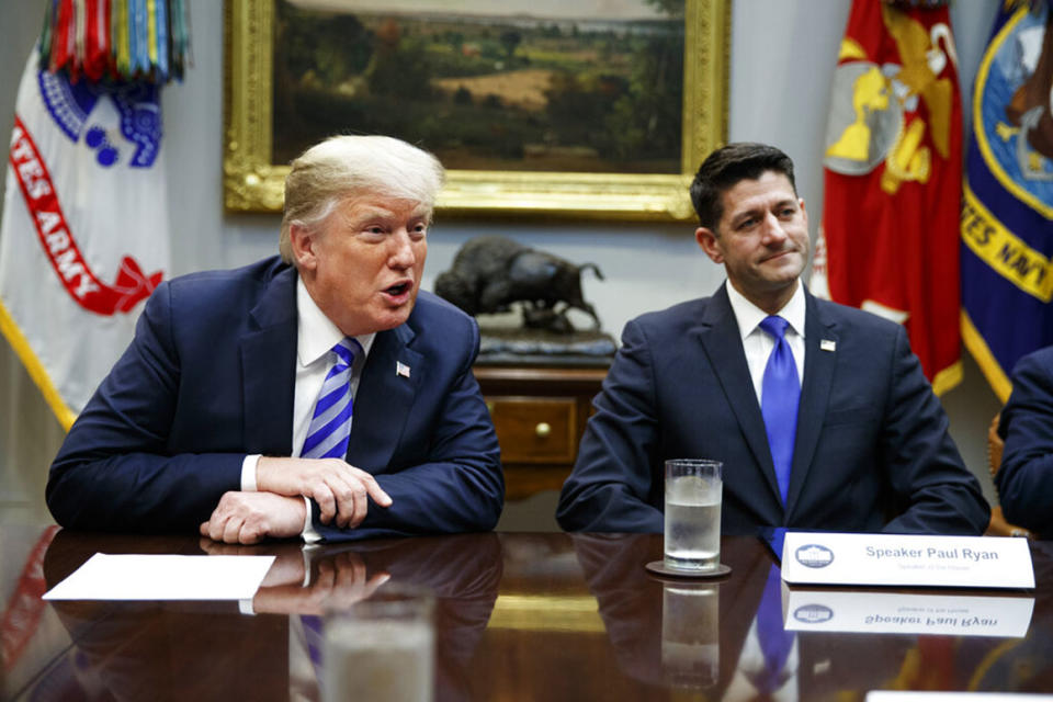 FILE - In this Sept. 5, 2018, file photo, then Speaker of the House Rep. Paul Ryan, R-Wis., listens to President Donald Trump speak during a meeting with Republican lawmakers in the Roosevelt Room of the White House in Washington. Trump unloaded an angry late-night tweetstorm on Ryan, calling Ryan a “lame duck failure” who “had the Majority and blew it away.” Ryan is very critical of Trump in the book “American Carnage” by Tim Alberta of Politico, which had excerpts in various publications this week. Alberta wrote the former speaker could not stand the idea of another two years with the president and saw retirement as the 