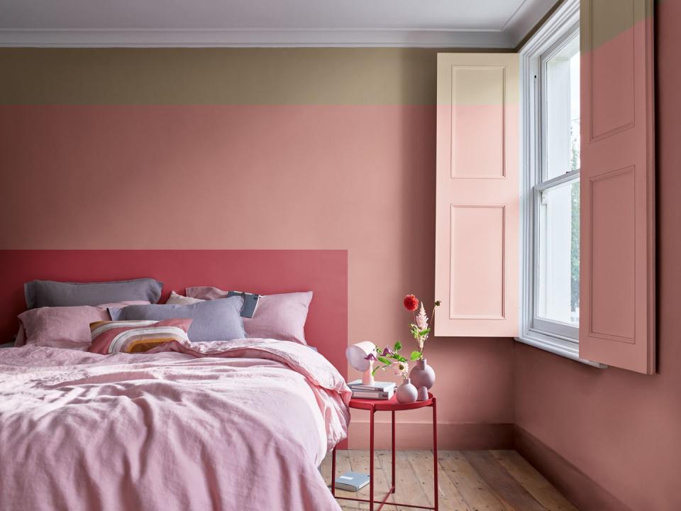 <p>If you're looking for bold pink and grey bedroom ideas, embrace various shades of pink in a colour block (like a headboard as seen here) — and add in grey through soft furnishings. Punchy and playful, you can create the pink grown-up bedroom of your dreams.</p><p>'Try using two shades of the same colour,' says Rob Abrahams, Co-Founder of <a href="https://coatpaints.com/" rel="nofollow noopener" target="_blank" data-ylk="slk:COAT Paints;elm:context_link;itc:0;sec:content-canvas" class="link ">COAT Paints</a>. 'It's a nice way to add interest to a space by creating a complementary tonal scheme, rather than a more traditional contrast wall or ceiling.'</p><p>• '<a href="https://go.redirectingat.com?id=127X1599956&url=https%3A%2F%2Fwww.dulux.co.uk%2Fen%2Fcolour-details%2Fstolen-rose&sref=https%3A%2F%2Fwww.housebeautiful.com%2Fuk%2Fdecorate%2Fbedroom%2Fg37103497%2Fpink-grey-bedroom%2F" rel="nofollow noopener" target="_blank" data-ylk="slk:Stolen Rose;elm:context_link;itc:0;sec:content-canvas" class="link ">Stolen Rose</a>', '<a href="https://go.redirectingat.com?id=127X1599956&url=https%3A%2F%2Fwww.dulux.co.uk%2Fen%2Fcolour-details%2Fpink-sandstone&sref=https%3A%2F%2Fwww.housebeautiful.com%2Fuk%2Fdecorate%2Fbedroom%2Fg37103497%2Fpink-grey-bedroom%2F" rel="nofollow noopener" target="_blank" data-ylk="slk:Pink Sandstone;elm:context_link;itc:0;sec:content-canvas" class="link ">Pink Sandstone</a>' and '<a href="https://go.redirectingat.com?id=127X1599956&url=https%3A%2F%2Fwww.dulux.co.uk%2Fen%2Fcolour-details%2Fbrave-ground&sref=https%3A%2F%2Fwww.housebeautiful.com%2Fuk%2Fdecorate%2Fbedroom%2Fg37103497%2Fpink-grey-bedroom%2F" rel="nofollow noopener" target="_blank" data-ylk="slk:Brave Ground;elm:context_link;itc:0;sec:content-canvas" class="link ">Brave Ground</a>' paint colours all by Dulux</p>