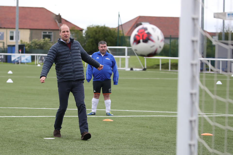 <p>The Duke of Cambridge on the pitch during a visit to Spartans FC's Ainslie Park Stadium in Edinburgh to hear about initiatives in Scottish football that champion mental health ahead of the Scottish Cup Final on Saturday. Picture date: Friday May 21, 2021.</p>
