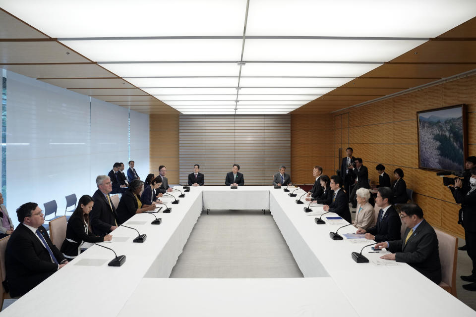 U.S. Ambassador to United Nations Linda Thomas-Greenfield, fourth left, meets with Japan's Chief Cabinet Secretary Yoshimasa Hayashi, center top, and the families of abduction victims by North Korea Thursday, April 18, 2024, at prime minister's office in Tokyo in Tokyo. (AP Photo/Eugene Hoshiko, Pool)