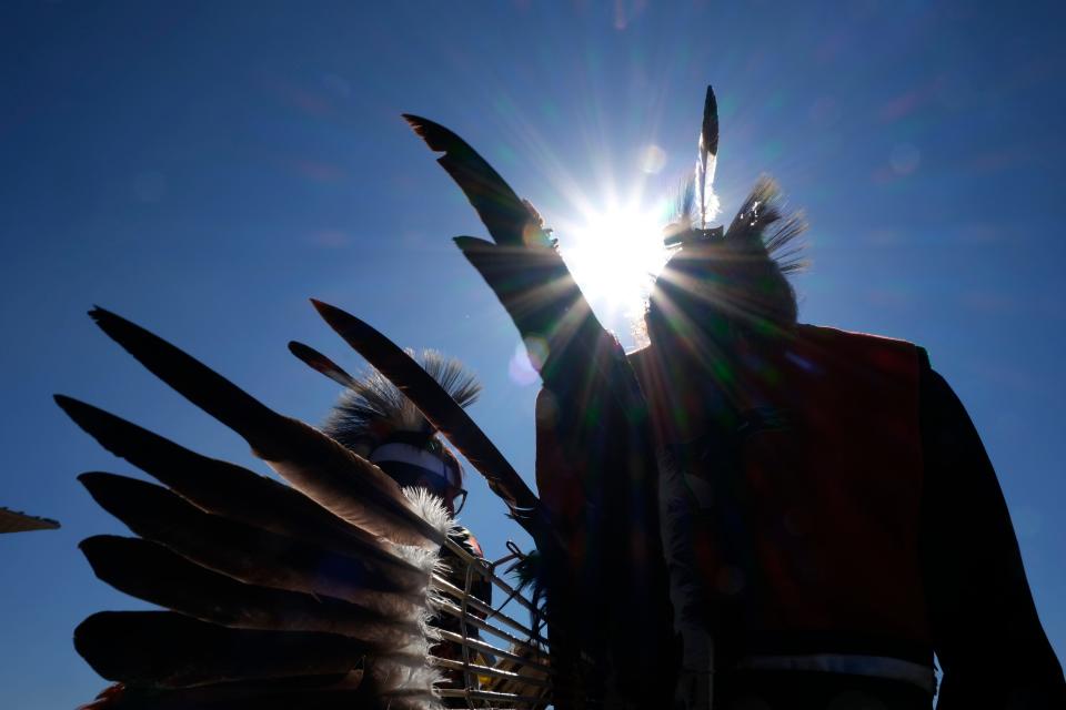 Two dancers from Moore Public Schools watch their classmates perform during the 2023 Indigenous Peoples Day celebration at the First American Museum in Oklahoma City.