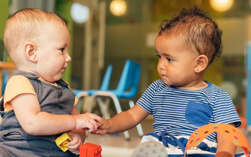 Babies playing together