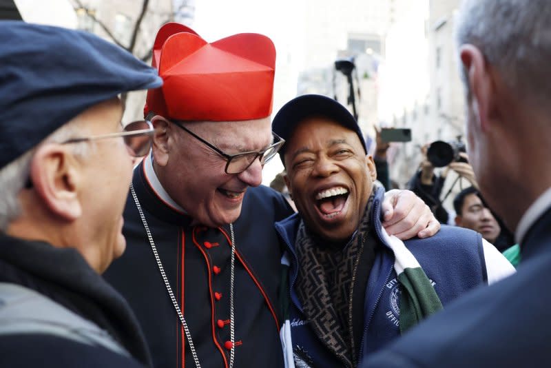 Archbishop of New York Cardinal Timothy Dolan greets New York City Mayor Eric Adams at the St. Patrick's Day Parade on Fifth Avenue in New York City on Saturday. Photo by John Angelillo/UPI